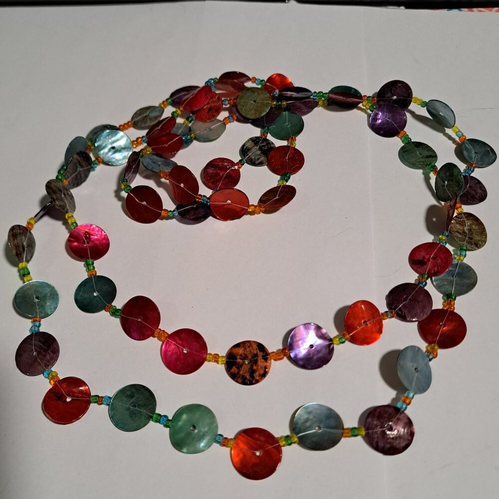 very long necklace mother of pearl look beaded purple red blue circle discs